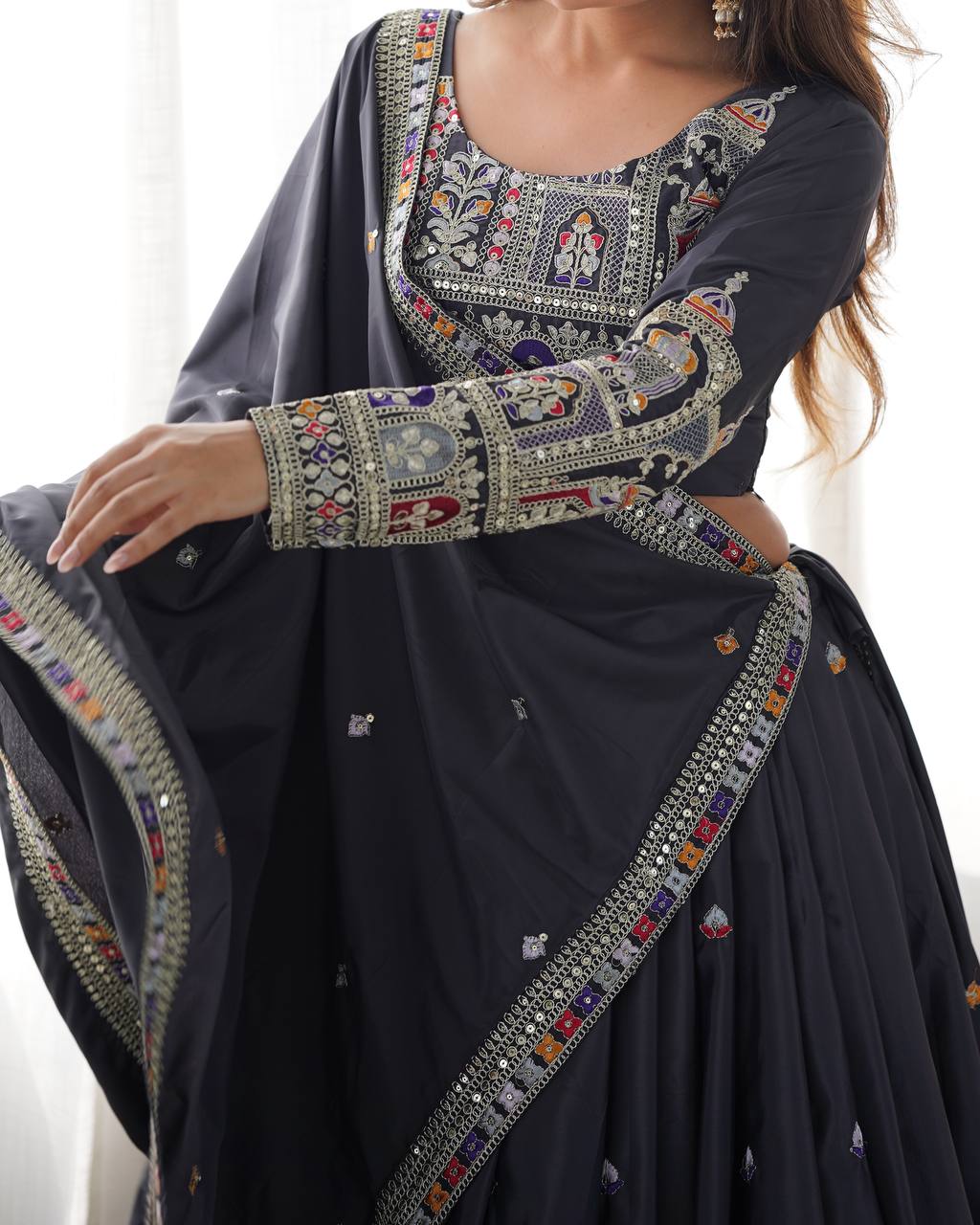Majestic Midnight Black Designer Lehenga Choli Featuring Intricate Multicolored Architectural Embroidery and Mirror Work